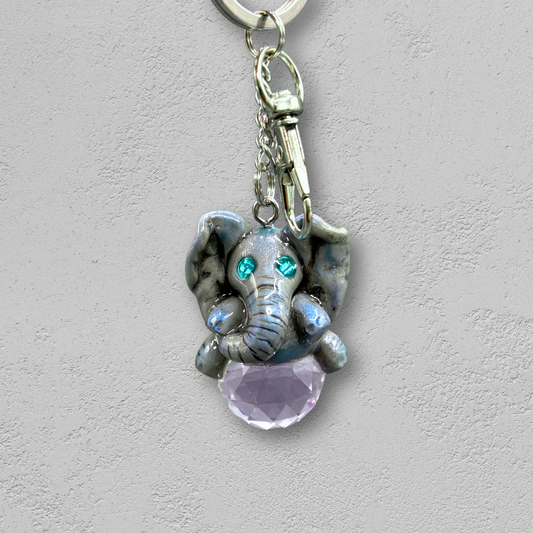 Keychain with elephant charm and clear crystal on a light background