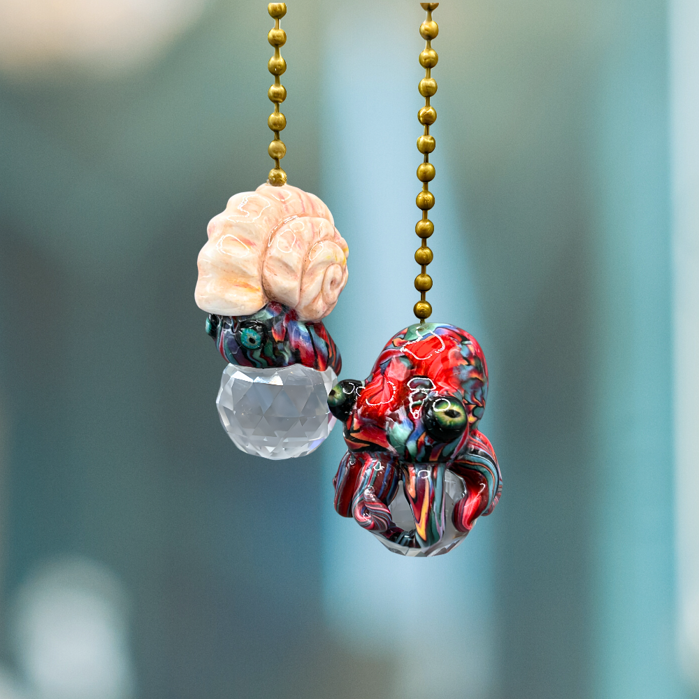 A colorful set of handmade Octopus and Sea snail Light pulls