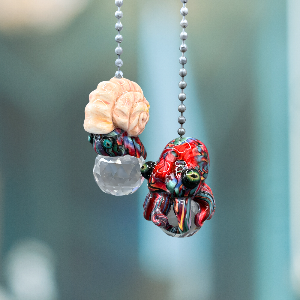 A colorful set of handmade Octopus and Sea snail Light pulls