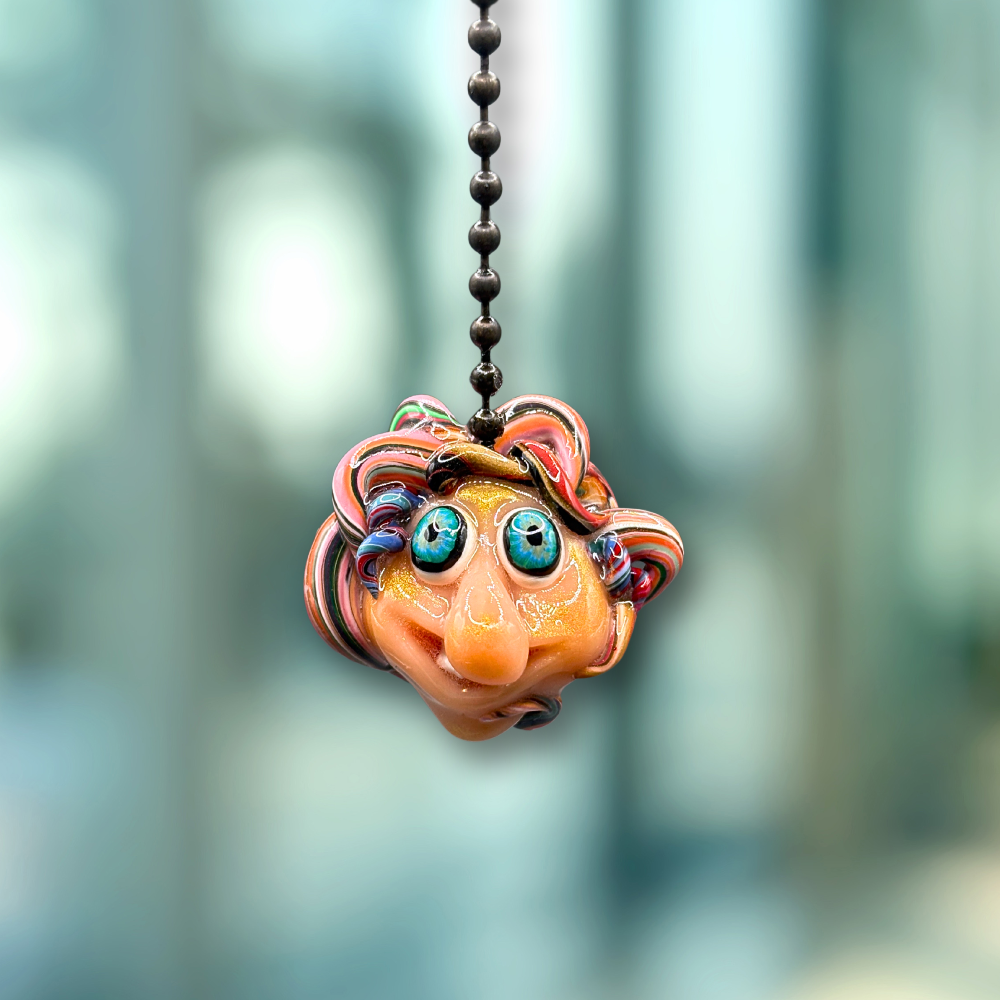 Decorative ceiling fan pull chain named Sampie, with a colorful, cartoon-like design.