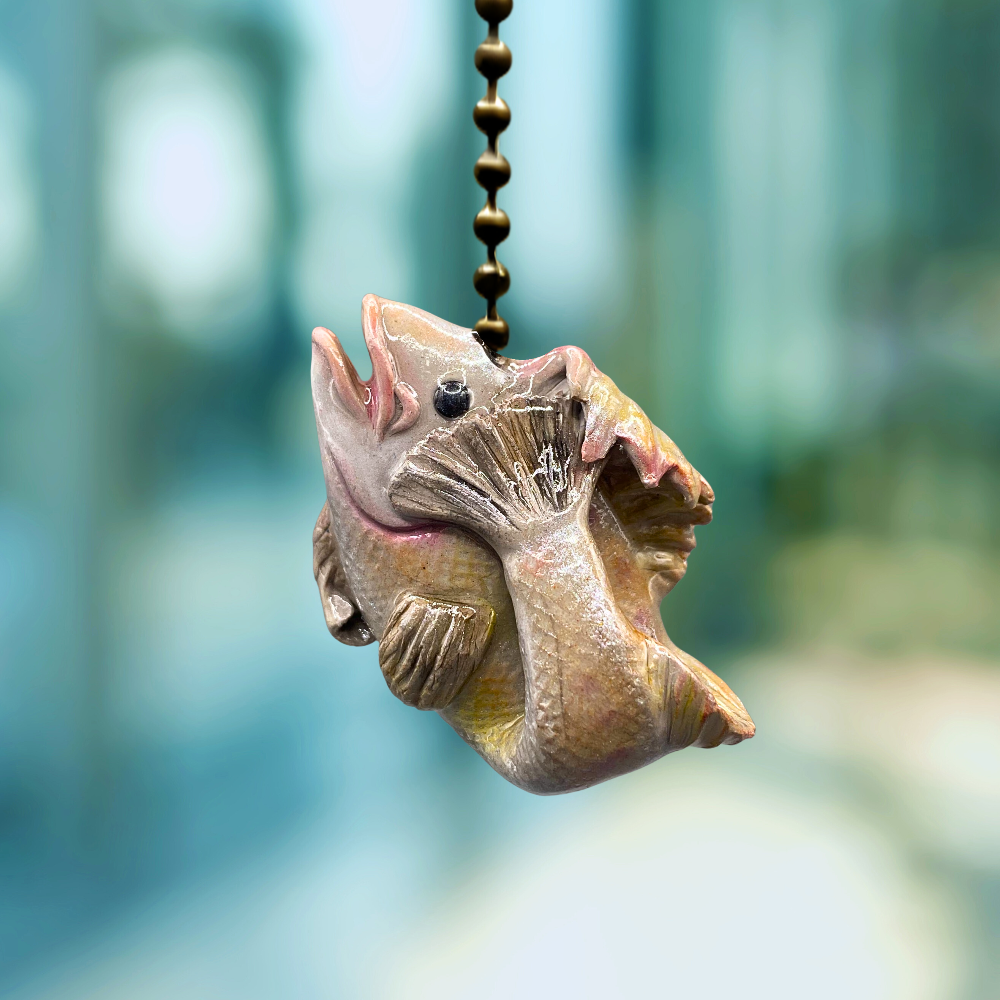 Walleye fish charm used for light or fan pulls.