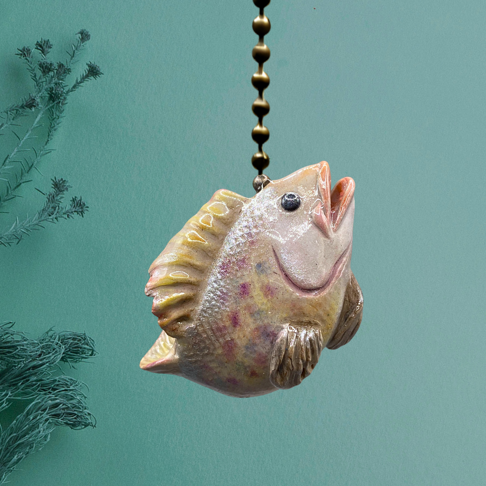 Walleye fish charm used for light or fan pulls.