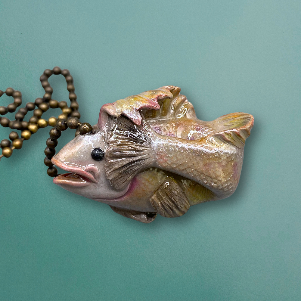 Walleye fish charm used for light or fan pulls.