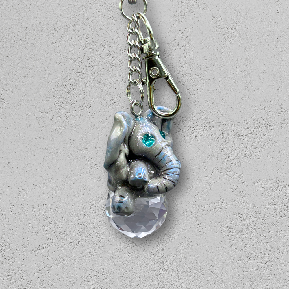 Keychain with elephant charm and clear crystal on a light background