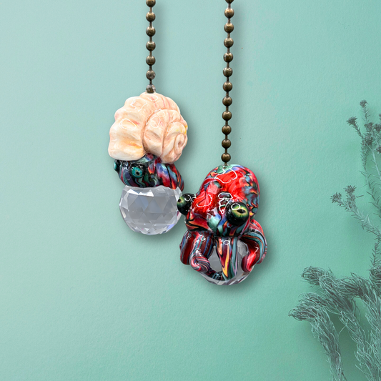 A colorful set of handmade Octopus and Sea snail Light pulls
