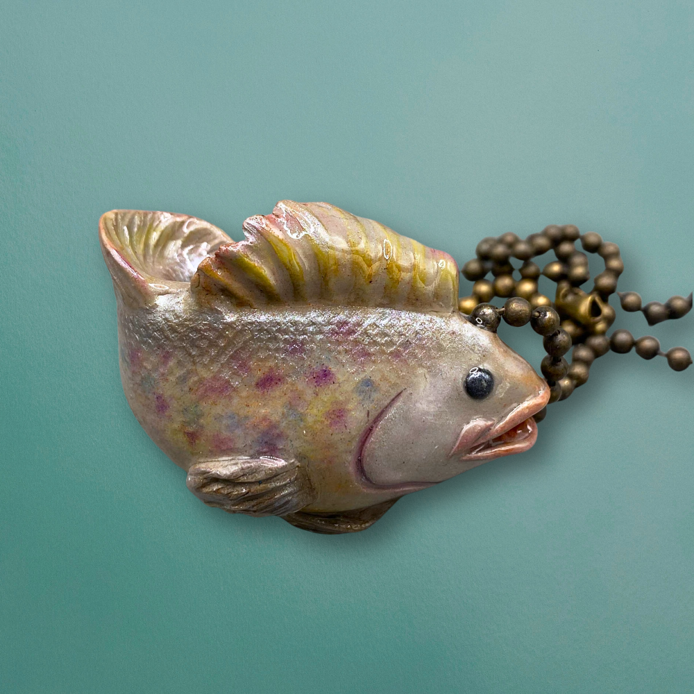 Walleye fish charm used for light or fan pulls.