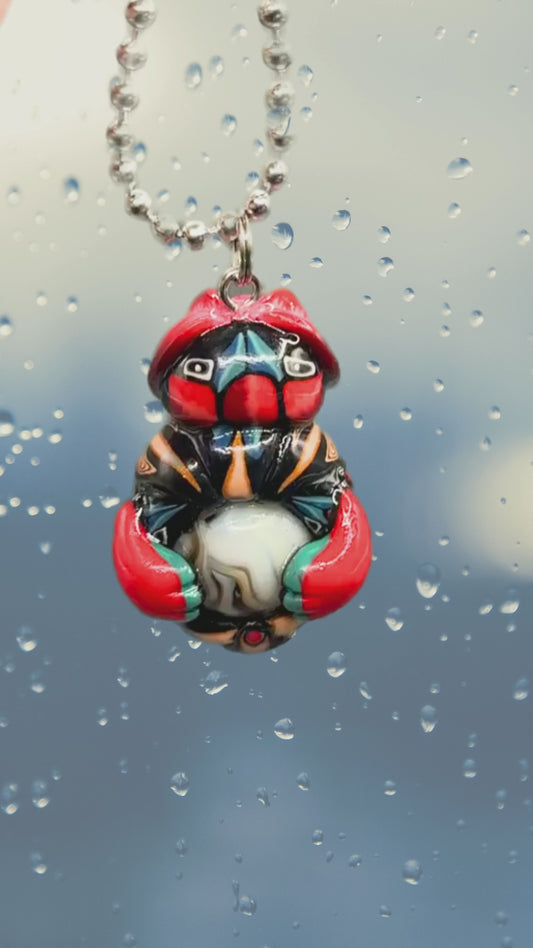 This Red bug car charm for your rear view mirror is handmade with Polymer clay. Its a unique car cham with a real marble in its belly. 