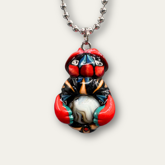 This Red bug car charm for your rear view mirror is handmade with Polymer clay. Its a unique car cham with a real marble in its belly. 